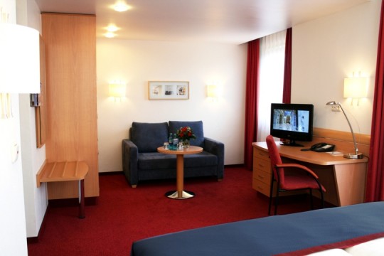 Deluxe Zimmer mit Sitzecke im Garden Hotel Bremen